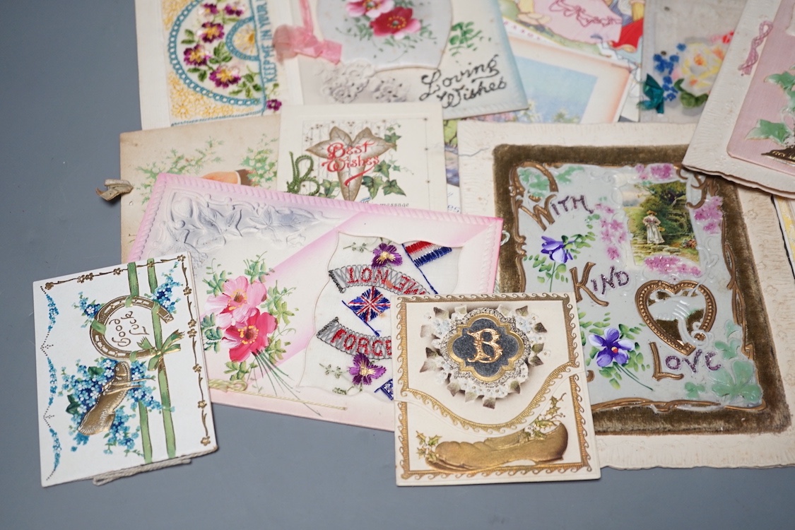 A collection of postcards and greetings cards